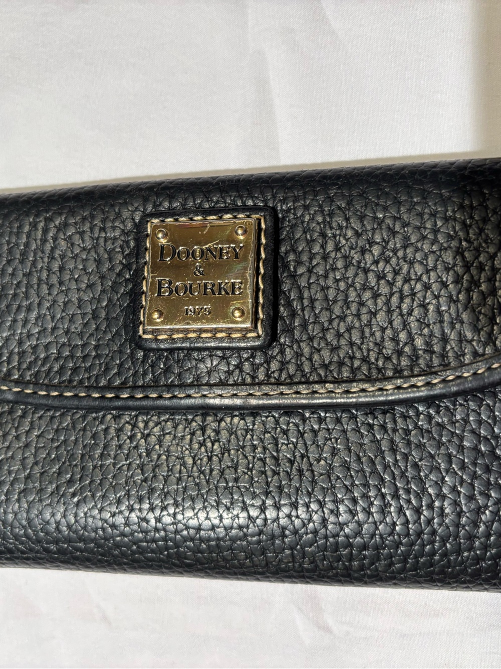 Dooney & Bourke Black Pebble Leather Continental Wallet with Brass Logo